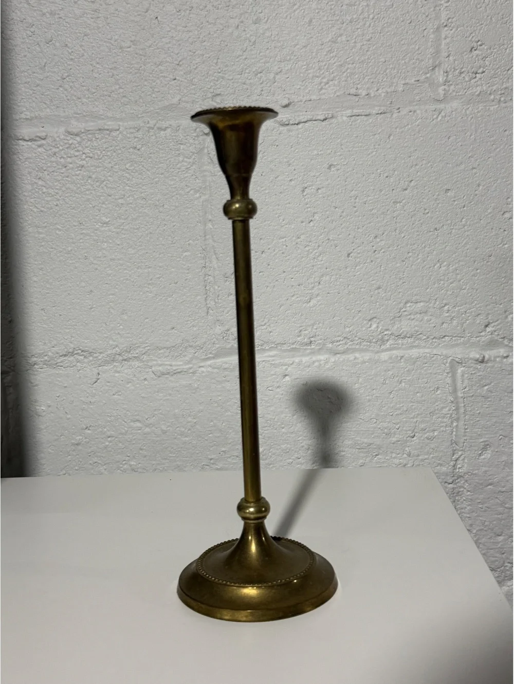 Vintage brass tall delicate beaded rim candlestick